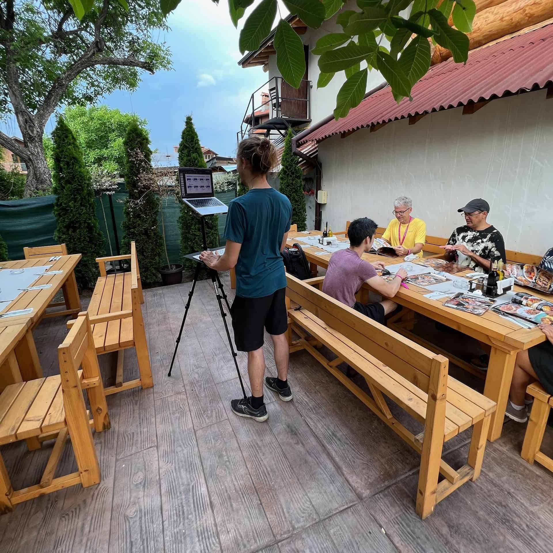 Working at a cafe with the StandMore travel standing desk