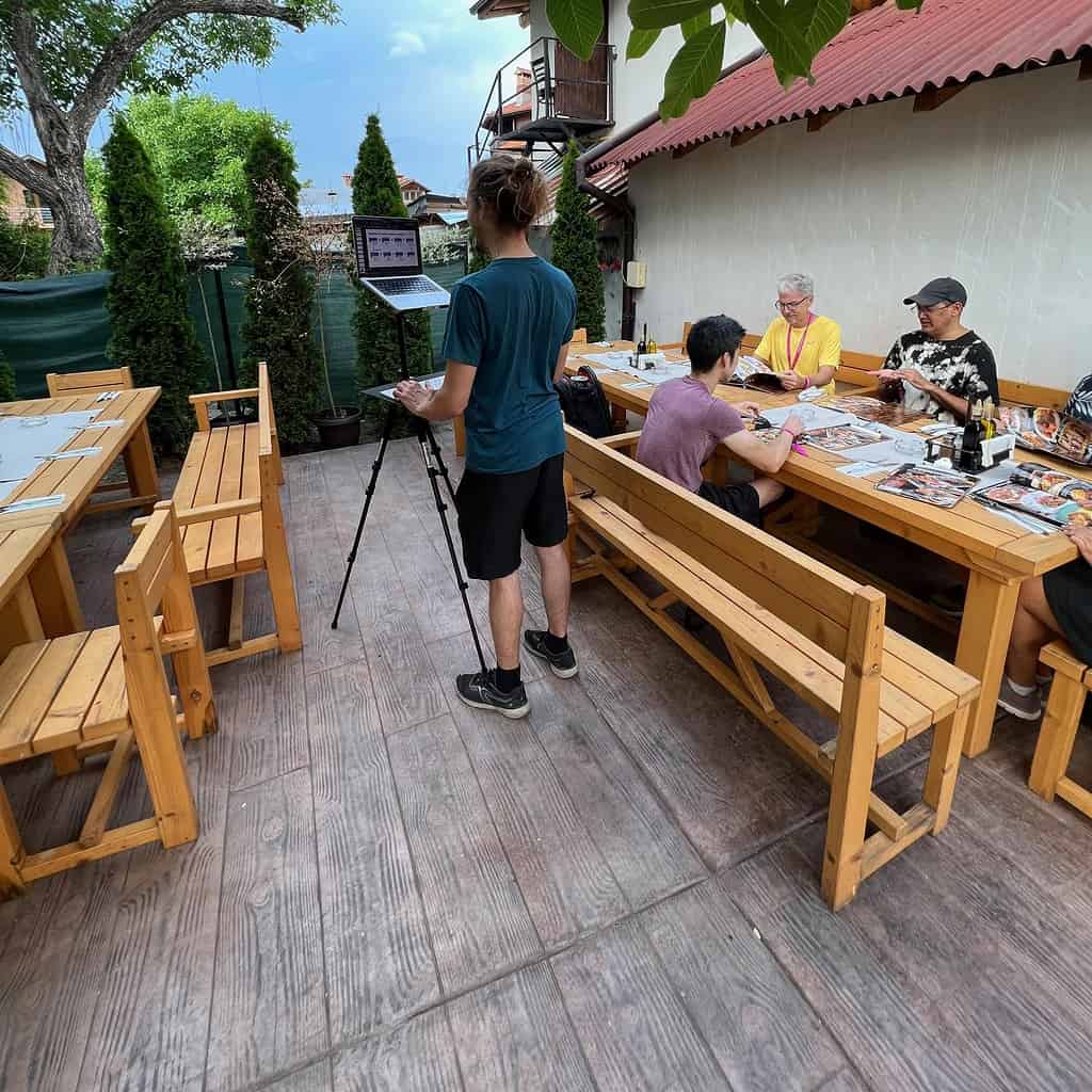 Working at a cafe with the StandMore travel standing desk